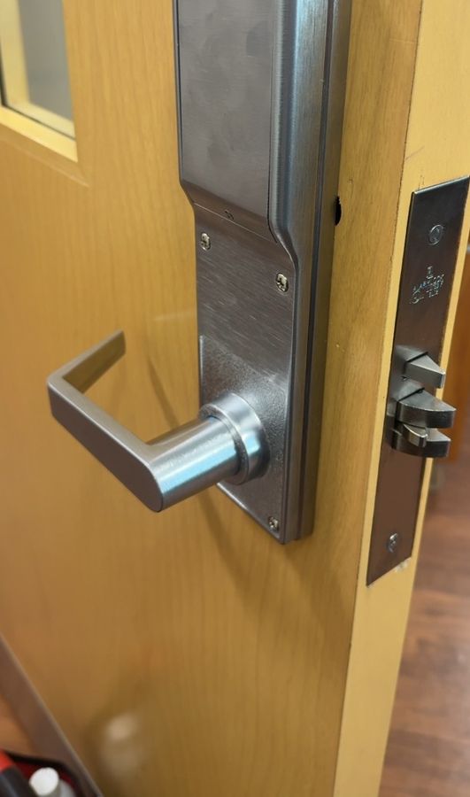 New lever lock and escutcheon installed on the same door, Kernersville NC