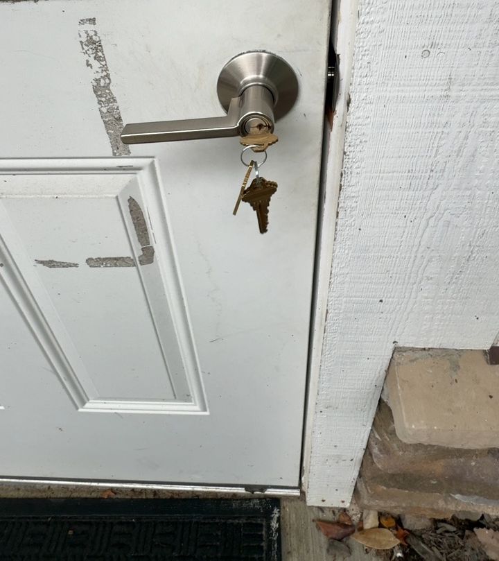 New satin lever with keys in the cylinder on the same door, Boone NC