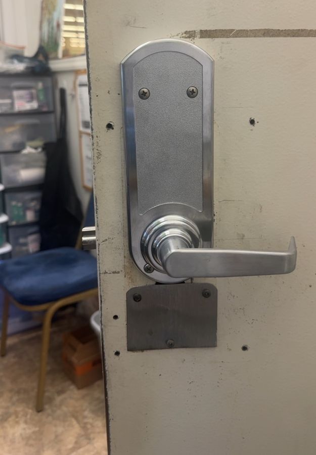 New lever and cover plate fitted where the pushbutton lock was, Hickory NC